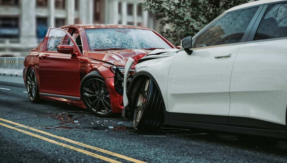 Front-end car crash scene with visible damage, representing post-accident legal support.