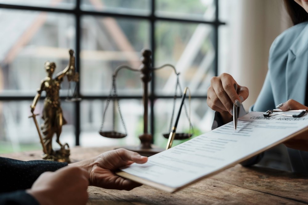 Lawyer reviewing an agreement with a client